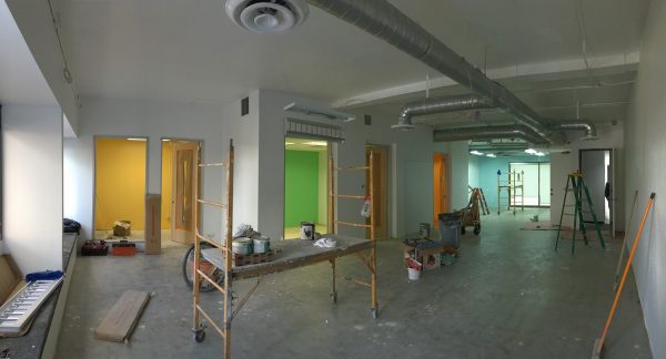 The space with paint finished and French doors installed in meeting rooms.