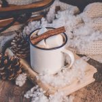 Mug of cocoa in winter scene